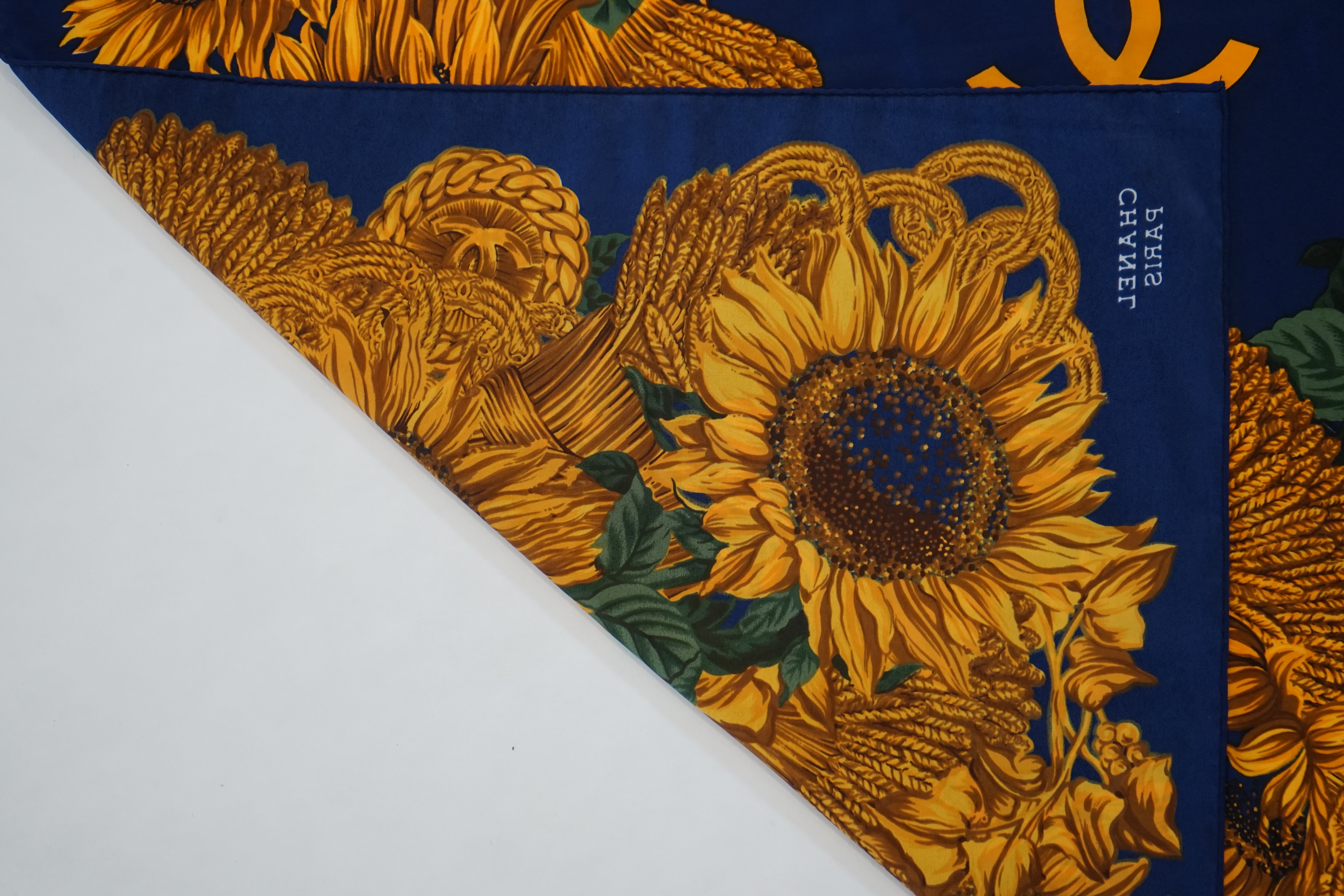A Vintage Chanel Logo Floral Sunflowers silk scarf, width 86.5cm, height 87.5cm